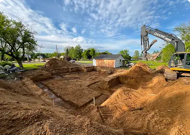 House foundation excavation in Norfolk — D5 Excavating specializing in professional residential foundation digging and site preparation.